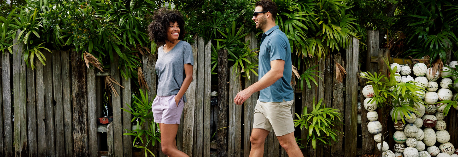 Man and Woman walking at the beach while wearing bamboo apparel